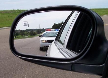 TRAFFIC-POLICE-in-car-mirror